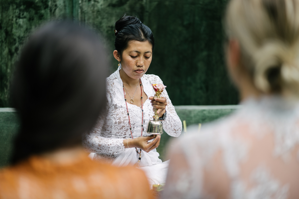Purification ceremony and water blessing with Tya priestess in Bali