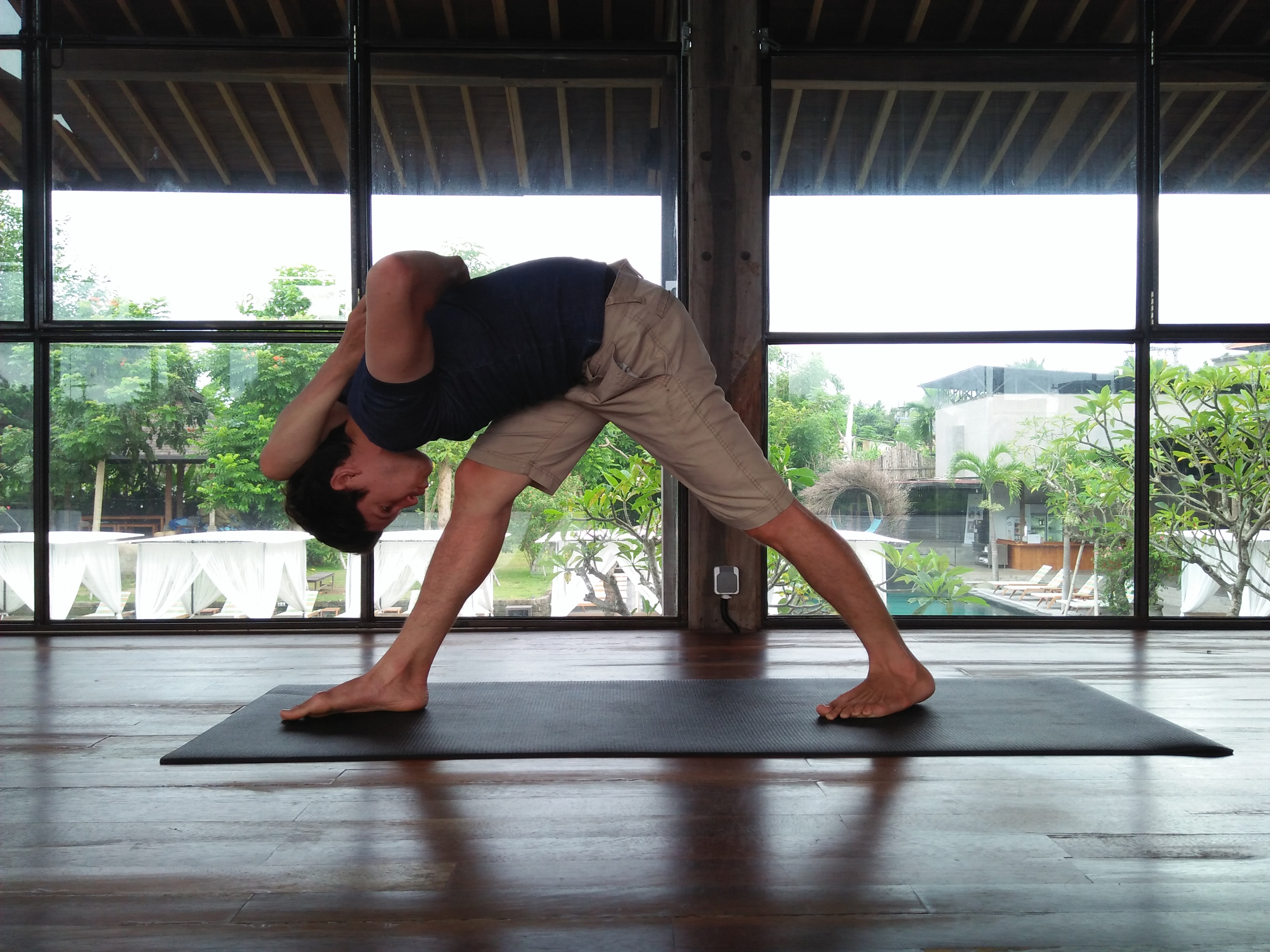 Jero Tya's husband doing yoga.