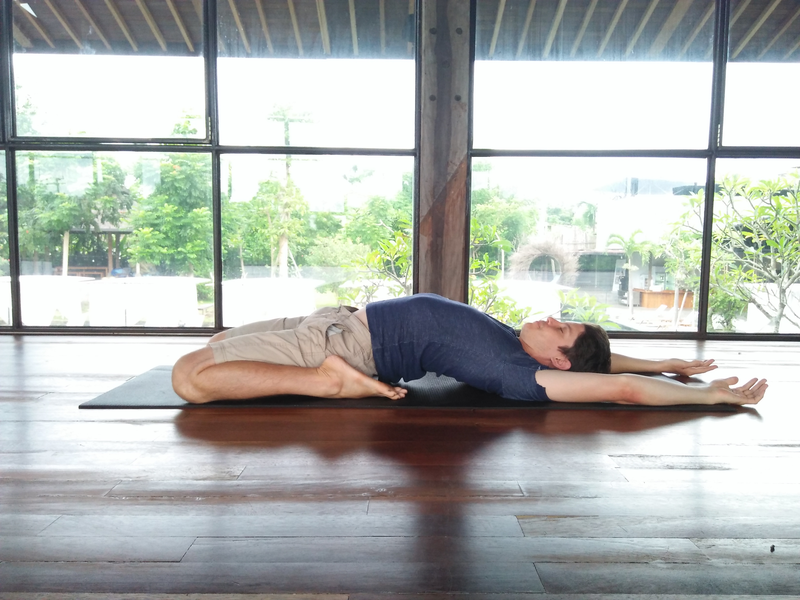 Jero Tya's husband doing yoga.